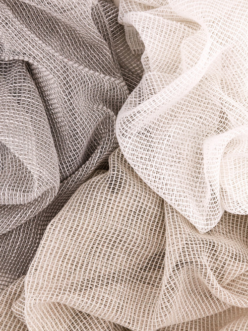 Detail of textured sheer fabric in neutral tones