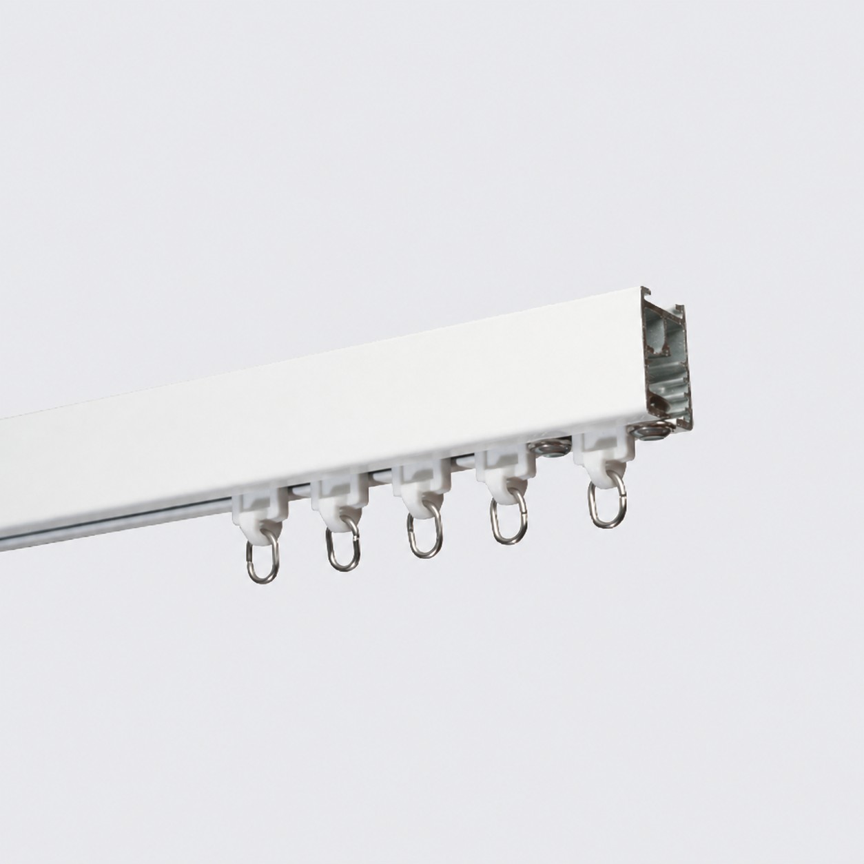 Heavy duty hand drawn curtain track with metal roller runners