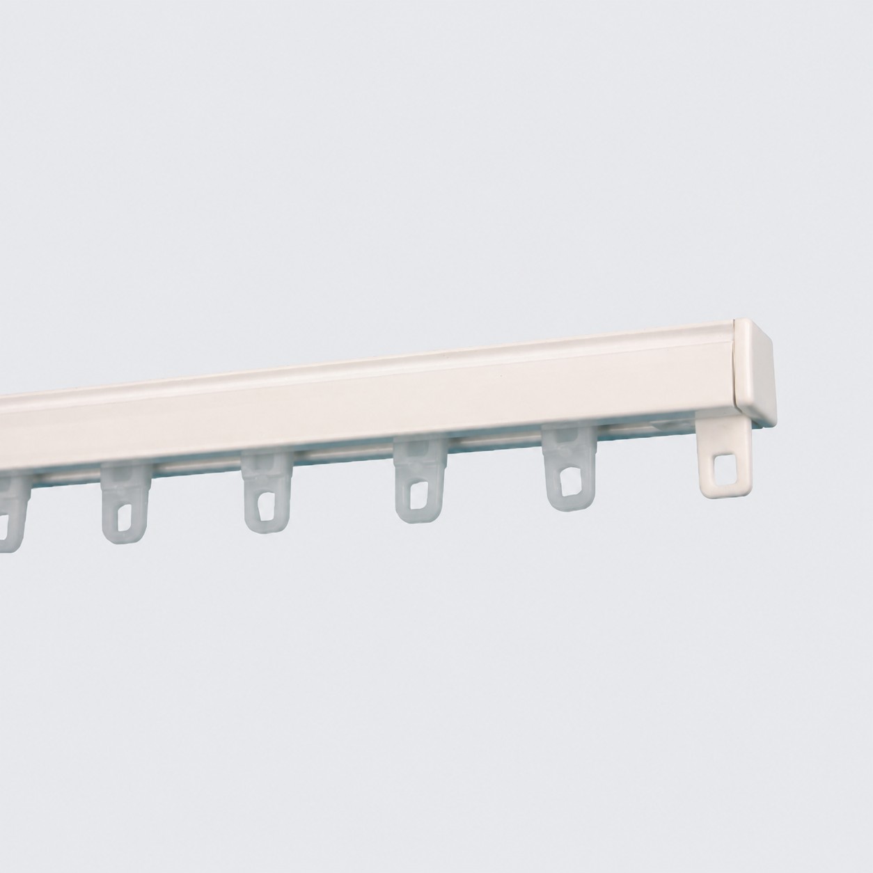 White hand drawn track with gliders for medium to heavy curtains